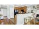 Kitchenette features a breakfast bar with stylish stools, wooden cabinets, and stainless steel appliances at 1052 Whitlow Blvd, Summerville, SC 29483
