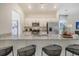 Bright kitchen with stainless steel appliances, a granite countertop island, and bar stool seating at 111 O'Leary Circle, Summerville, SC 29483