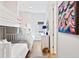 Shared bedroom featuring a bunkbed, a desk, and coastal decor at 112 E Huron Ave # C, Folly Beach, SC 29439