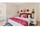 Stylishly decorated bedroom with white bedding and colorful accents at 112 E Huron Ave # C, Folly Beach, SC 29439