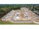 An aerial view of a new construction community surrounded by forest at 114 River Hill Rd, Goose Creek, SC 29445