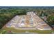 An aerial view of a new construction community surrounded by forest at 114 River Hill Rd, Goose Creek, SC 29445