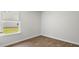 Cozy bedroom with window, clean walls, and modern baseboards at 114 River Hill Rd, Goose Creek, SC 29445