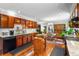 Traditional kitchen with rich wood cabinetry, stainless steel appliances, and a hardwood floor at 114 Sharon Dr, Walterboro, SC 29488