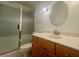 Bathroom featuring updated vanity and tiled shower with glass doors at 115 St Awdry St, Summerville, SC 29485