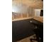 Partially finished attic space with a small carpet, showing potential as a bonus room at 125 Azalea Dr, Summerville, SC 29485