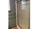 Bathroom showcasing a glass-enclosed shower with a handrail at 125 Azalea Dr, Summerville, SC 29485