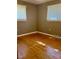 Cozy bedroom featuring hardwood floors and natural light at 125 Azalea Dr, Summerville, SC 29485
