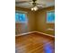 Bright bedroom with two windows and hardwood flooring at 125 Azalea Dr, Summerville, SC 29485
