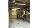Storage shed featuring built-in shelves, peg board for tool storage, bright lighting and electrical outlets at 125 Azalea Dr, Summerville, SC 29485