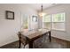 Cozy dining area bathed in natural light, features a stylish table and chairs at 150 Rockingham Way, Moncks Corner, SC 29461