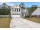 Charming two-story home with a two car garage and a well maintained yard at 150 Rockingham Way, Moncks Corner, SC 29461