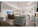 Open-concept kitchen, seamlessly connects to the living room and dining area, perfect for entertaining at 150 Rockingham Way, Moncks Corner, SC 29461