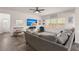 Comfortable living room features a large sectional sofa, TV, and lots of natural light at 150 Rockingham Way, Moncks Corner, SC 29461
