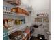 Organized pantry with wire shelving, providing ample storage space for food and household items at 150 Rockingham Way, Moncks Corner, SC 29461