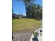 Lush backyard with a shed, trampoline, picnic table and ample green space at 1915 Sweetfern Rd, Hanahan, SC 29410