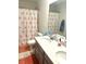 This bathroom has flamingo-themed decor and a dual sink vanity with quartz countertop at 1915 Sweetfern Rd, Hanahan, SC 29410