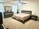 This bedroom features carpeted floors, an ceiling fan, and coordinated furniture set at 1915 Sweetfern Rd, Hanahan, SC 29410