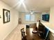 The bonus room features natural light, carpeted floors, and space for work or play at 1915 Sweetfern Rd, Hanahan, SC 29410
