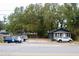 Street view of property with ample parking and classic design at 2008 Cosgrove Ave, North Charleston, SC 29405