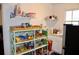 This pantry features white cabinets and butcher block countertops, and multiple rows of shelving at 2008 Cosgrove Ave, North Charleston, SC 29405