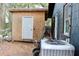 Plywood shed located next to a home and an AC unit at 2008 Cosgrove Ave, North Charleston, SC 29405