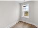 Cozy bedroom with hardwood flooring offers natural light from the window at 2185 Helm Ave, North Charleston, SC 29405