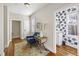 Hallway seating area with a lamp and blue chair is conveniently located near the bedrooms at 249 Ashley Ave, Charleston, SC 29403