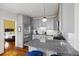 Bright kitchen featuring stainless steel appliances and granite counters at 249 Ashley Ave, Charleston, SC 29403