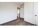 Bright bedroom features neutral walls, a ceiling fan, and stylish wood-look flooring at 2694 Olympia Ave, North Charleston, SC 29405