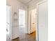 Hallway with multiple doorways and built in shelf at 2694 Olympia Ave, North Charleston, SC 29405