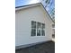 Exterior side view of home with window and siding at 3004 Harvey Ave, North Charleston, SC 29405