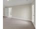Spacious bedroom featuring neutral carpet, white trim, and natural light at 304 O'Malley Dr, Summerville, SC 29483