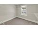 Walk-in closet with carpet, window, and shelving system at 304 O'Malley Dr, Summerville, SC 29483