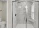 Modern shower features marble-look tile, glass door, and shower niche at 304 O'Malley Dr, Summerville, SC 29483