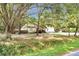 Charming single-story home featuring an ample front yard and mature trees at 317 Lankford St, Moncks Corner, SC 29461