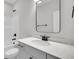 Bathroom featuring modern fixtures, granite countertops, and a large framed mirror at 324 Abercom Place Dr, Moncks Corner, SC 29461