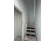 Stairway to the second floor featuring painted walls and a handrail at 324 Abercom Place Dr, Moncks Corner, SC 29461