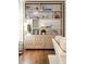 Modern built-in shelving featuring stylish decor and unique cabinet design at 32-E Prioleau St, Charleston, SC 29401