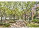 Picturesque community park with a tree-lined walkway, perfect for a peaceful stroll at 32-E Prioleau St, Charleston, SC 29401