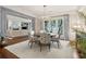 Dining room featuring hardwood floors, a chandelier and a large area rug at 32-E Prioleau St, Charleston, SC 29401