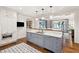 Gourmet kitchen featuring an open concept design, custom cabinets and modern appliances at 32-E Prioleau St, Charleston, SC 29401
