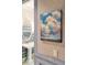 A tastefully decorated powder room featuring an interesting work of art at 32-E Prioleau St, Charleston, SC 29401