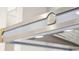 Close-up of a stylish stainless steel and blue range hood with detailed trim at 32-E Prioleau St, Charleston, SC 29401