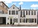 Charming home featuring classic architectural details and symmetrical design with black shutters at 35 Tradd St, Charleston, SC 29401