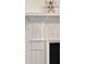 Detailed molding surrounds a black firebox and features a palm tree design near the top at 35 Tradd St, Charleston, SC 29401