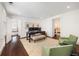 Office with three monitors, desk, and doorway leading to the next room at 35 Tradd St, Charleston, SC 29401