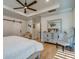 A cozy main bedroom offers hardwood floors, tray ceiling, and an elegant dressing table at 418 Myers Mayo Rd, Ridgeville, SC 29472