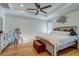 Bright bedroom featuring a wooden floor, neutral paint and a ceiling fan at 418 Myers Mayo Rd, Ridgeville, SC 29472