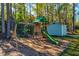 Outdoor play area with a swing set and slide, perfect for Gathering fun and recreation at 418 Myers Mayo Rd, Ridgeville, SC 29472